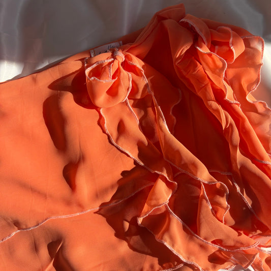 Orange tied ruffle skirt